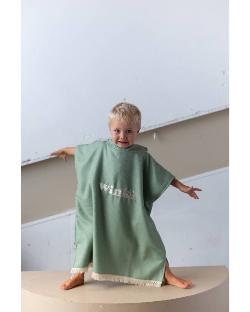 Child and Adult on Beach with Towel