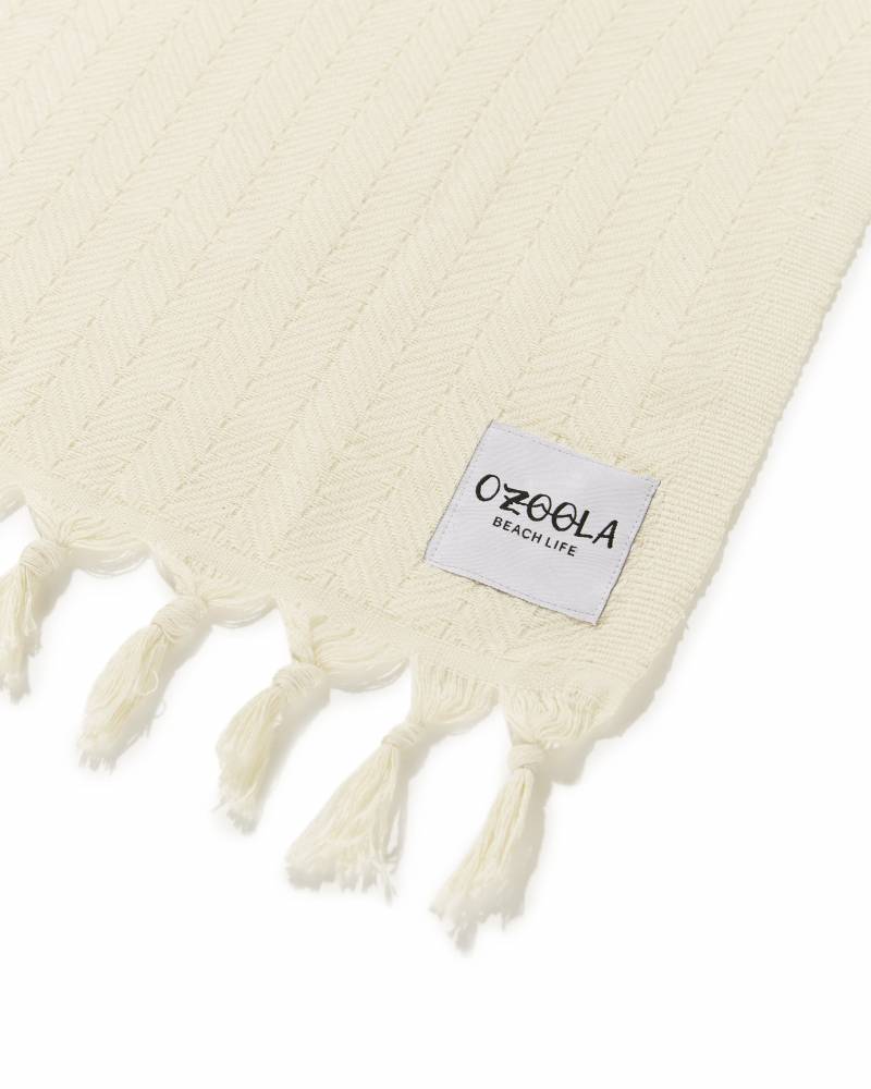Ozoola tag on Bronte family beach blanket