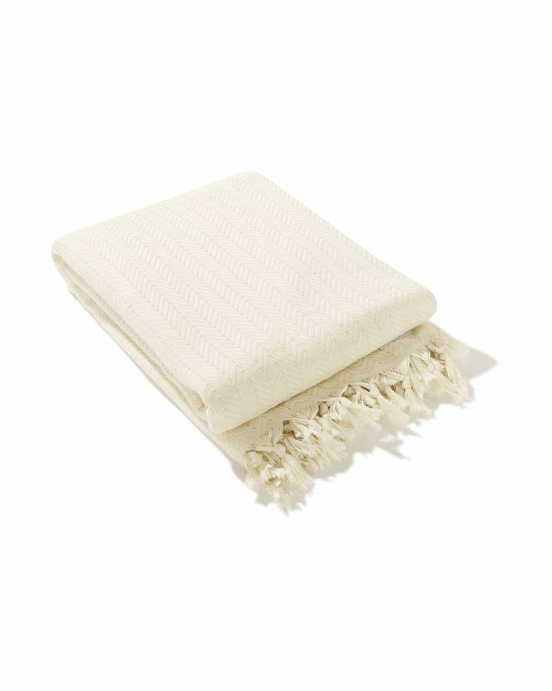 Ozoola tassels on Bronte family beach blanket