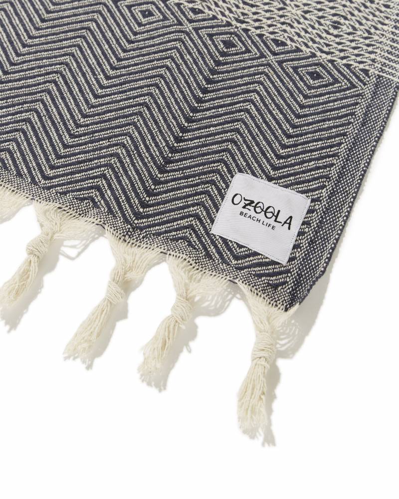 Deep blue blanket with tassels