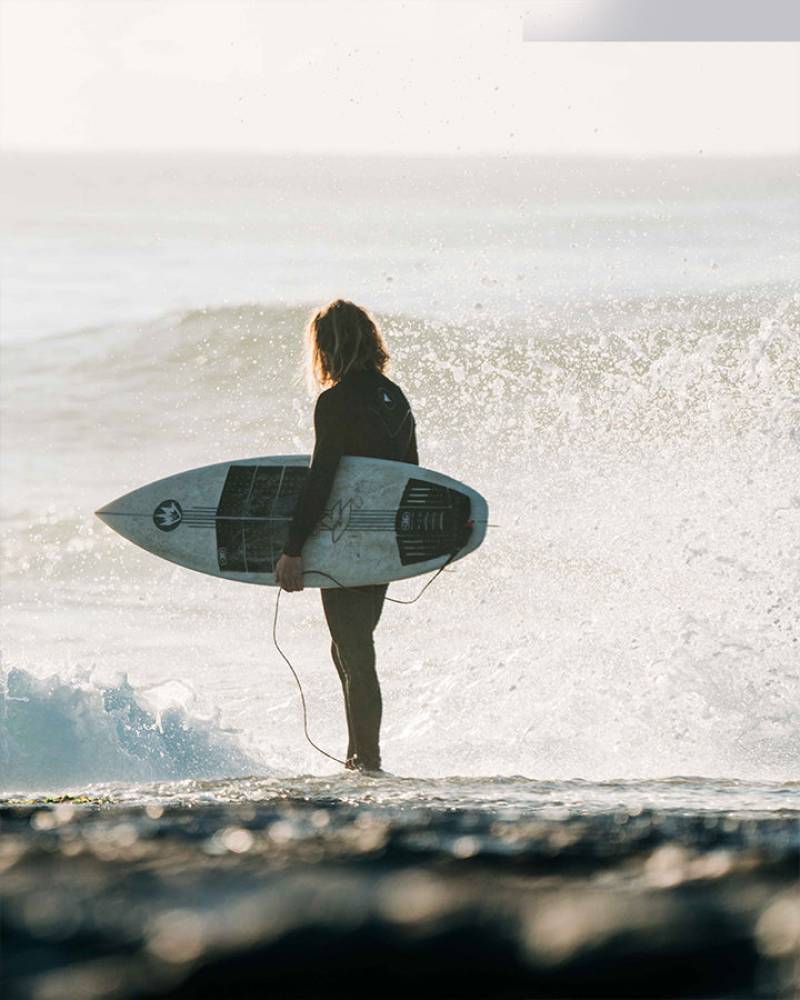 Seam Mawson surfing by Ocean and Earth