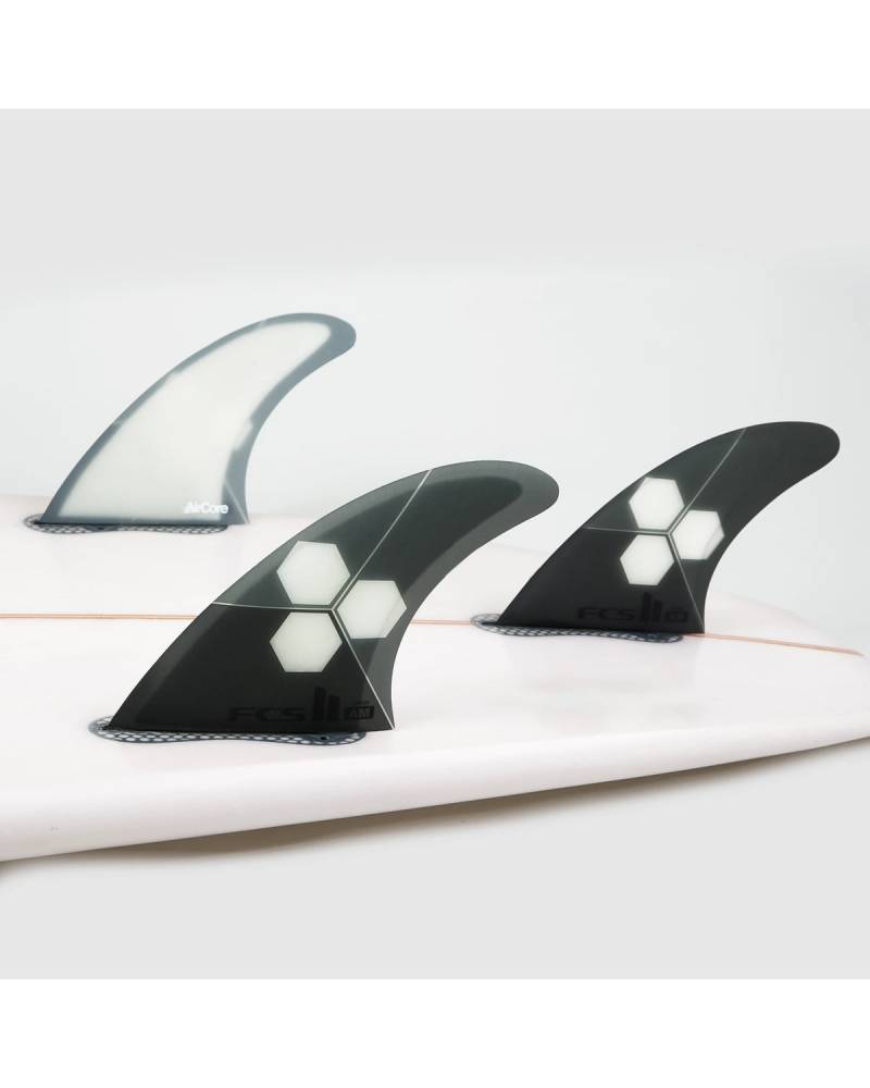 FCS II Al Merrick AIR CORE Tri Fins on a surfboard