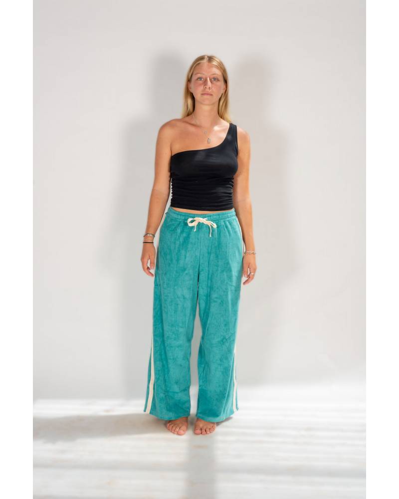 Model side view in pants outdoors