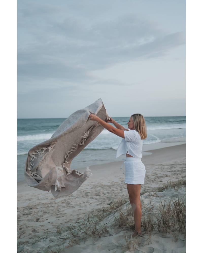 Diamond family blanket on beach