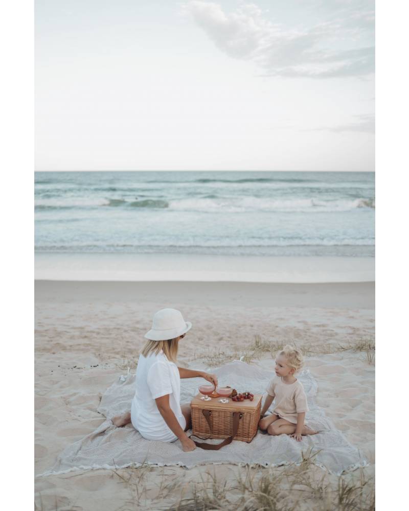 Diamond family blanket on beach