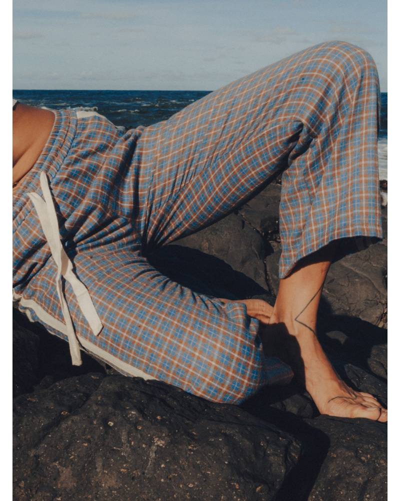 Flannel pants by car outdoors