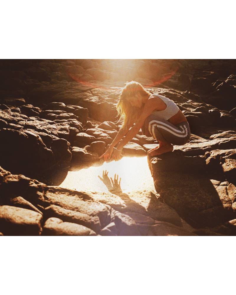 Flannel pants on rocks with sun