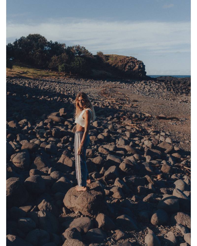 Flannel pants on rocks landscape