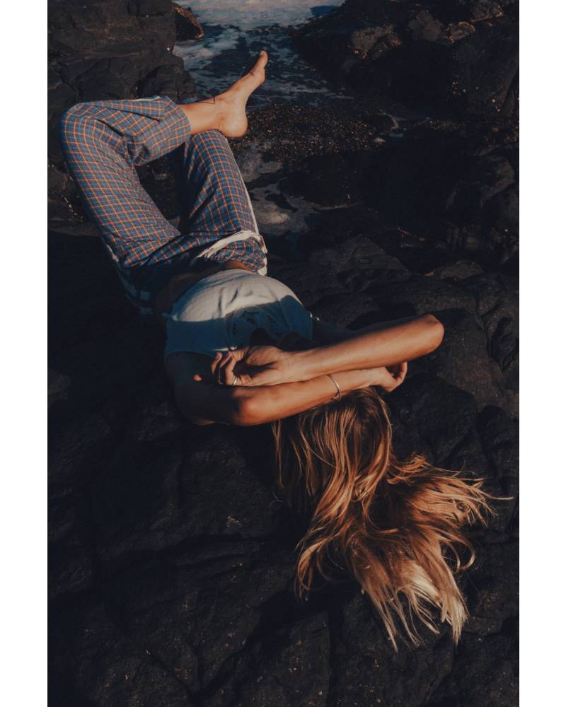 Flannel pants lying on rocks