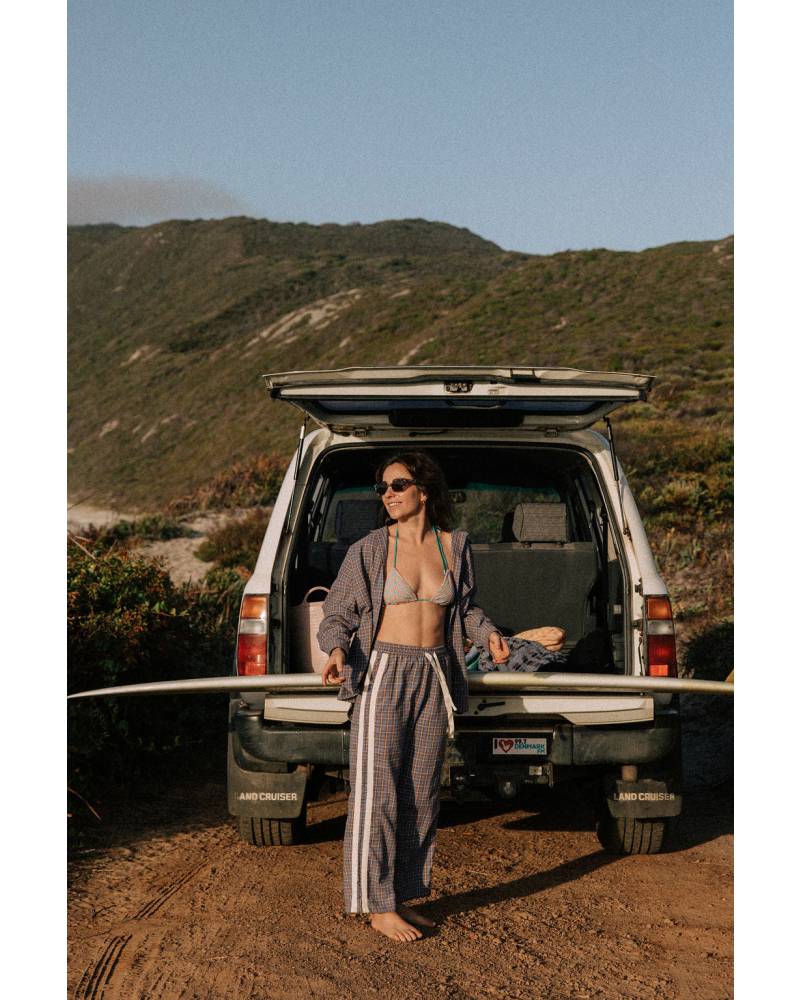 Flannel pants with surfboard