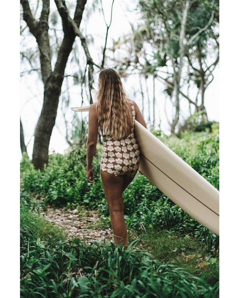 Back view with surfboard