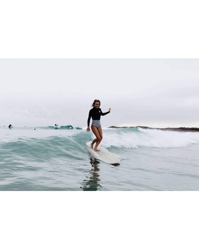 Inner Relm Daisy Venom 2mm Springsuit - Chequer model in action