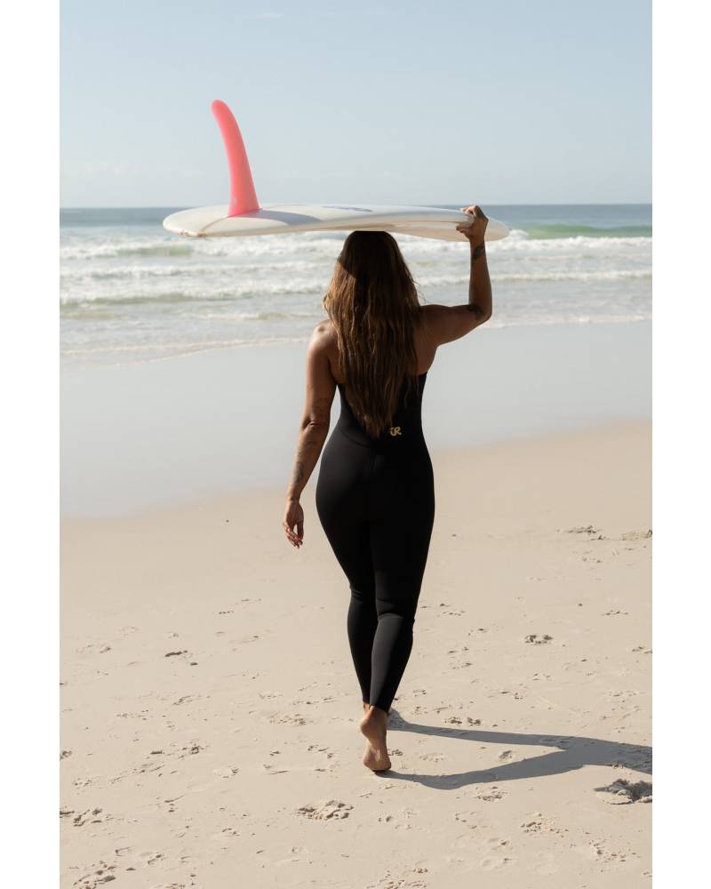 Model standing on beach