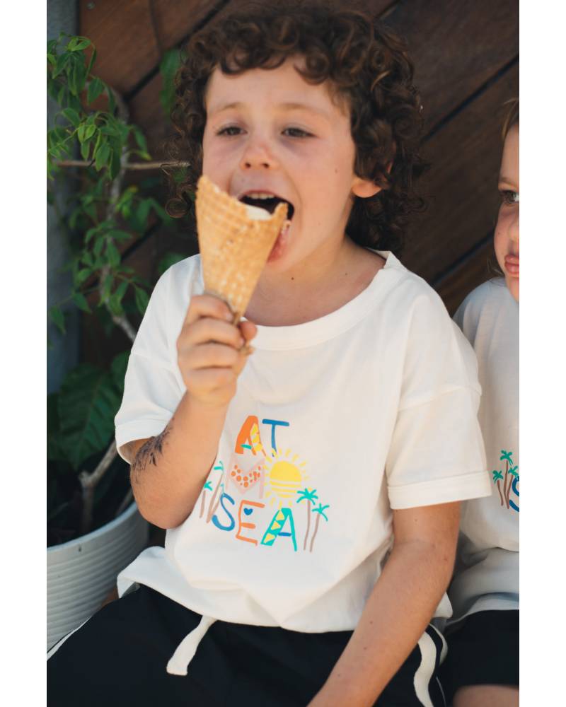 Child Eating Ice Cream in Tee