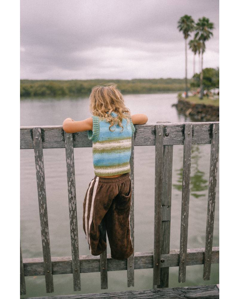 Two children by water