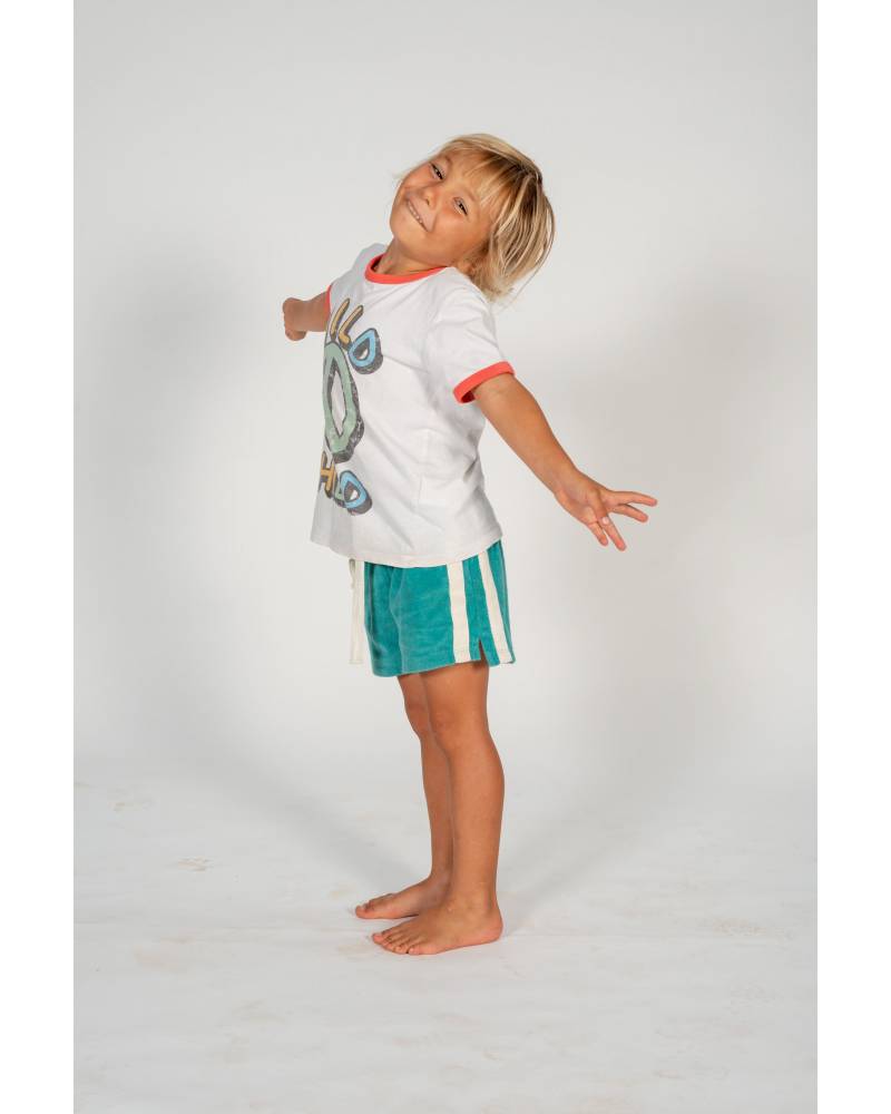 Child on skateboard standing