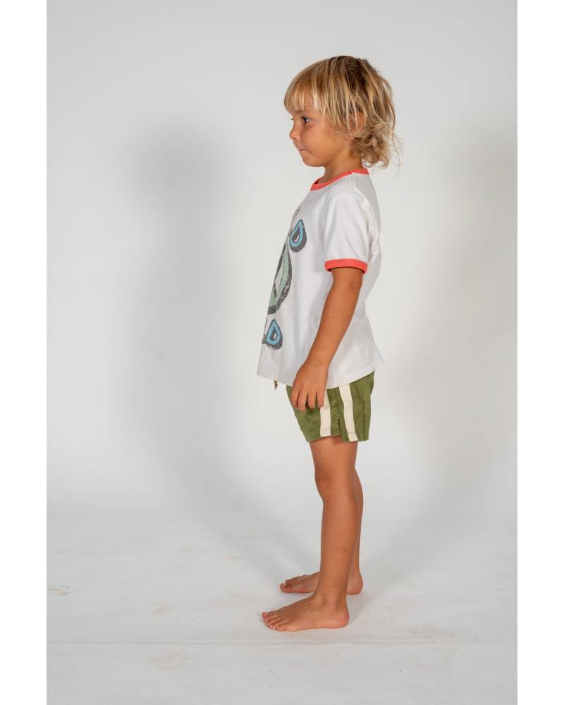 Child wearing shorts side