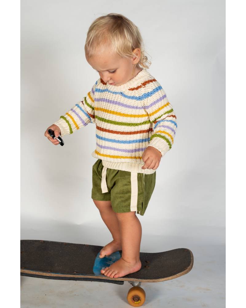 Toddler on skateboard