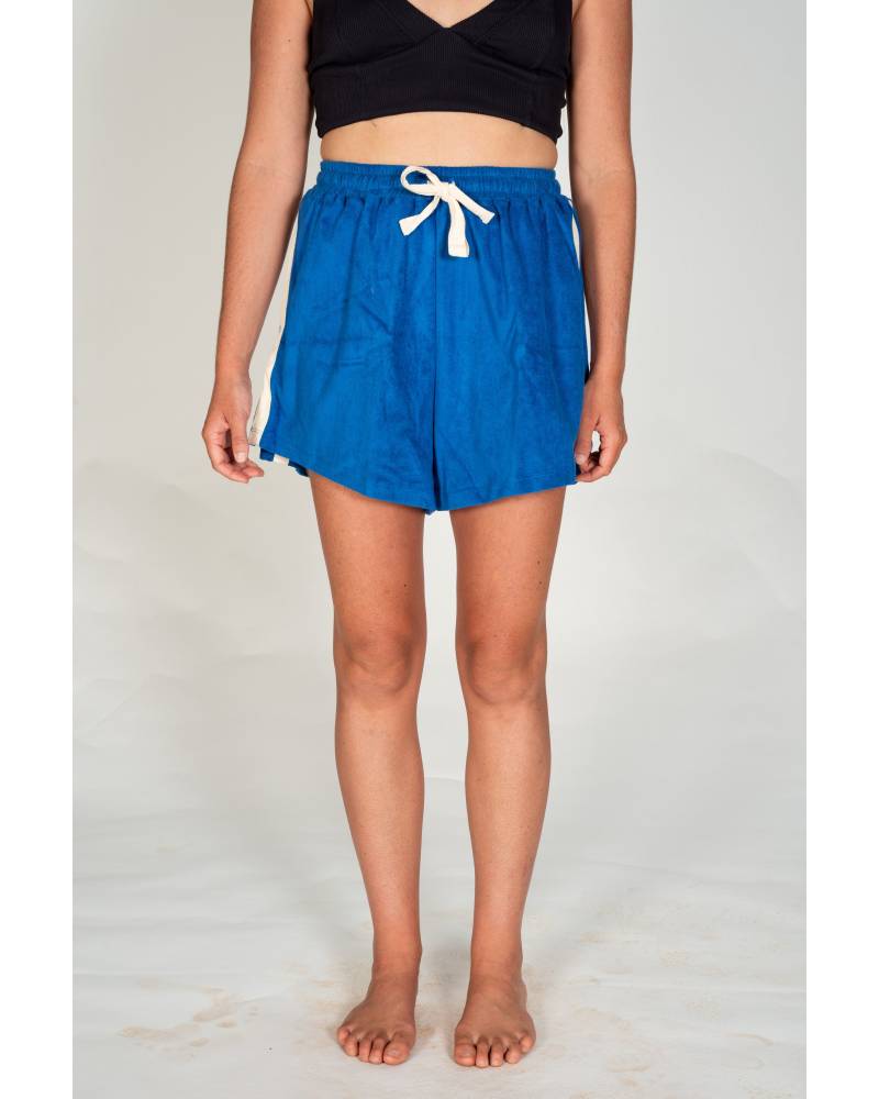 Model posing in Cobalt Terry Towelling Shorts