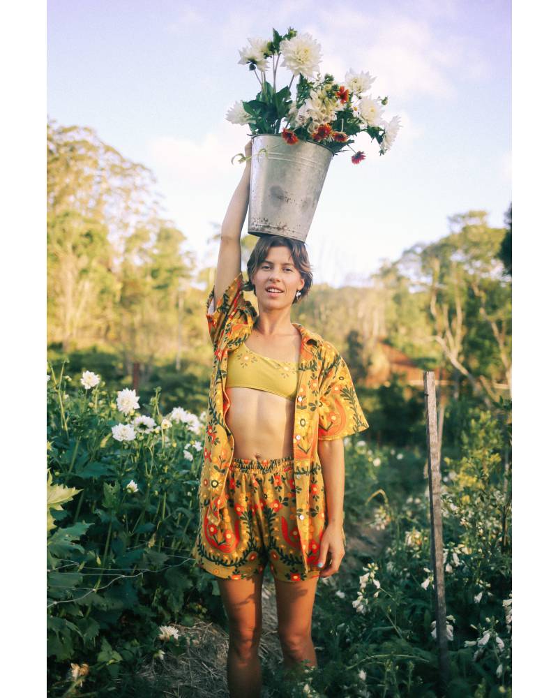Model in garden with flowers