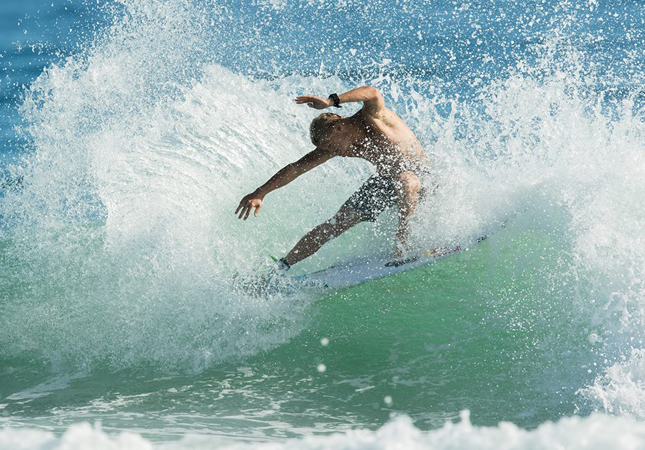 mick fanning testing out a ducks nuts replica