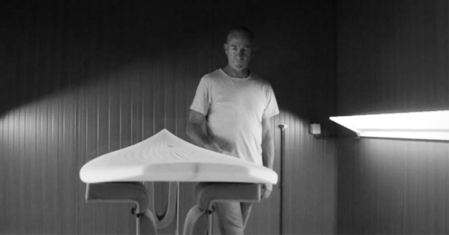 darren handley inspecting his shaping work
