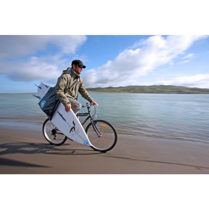 Curve Surfboard Sling - Shortboard on cyclist at the beach