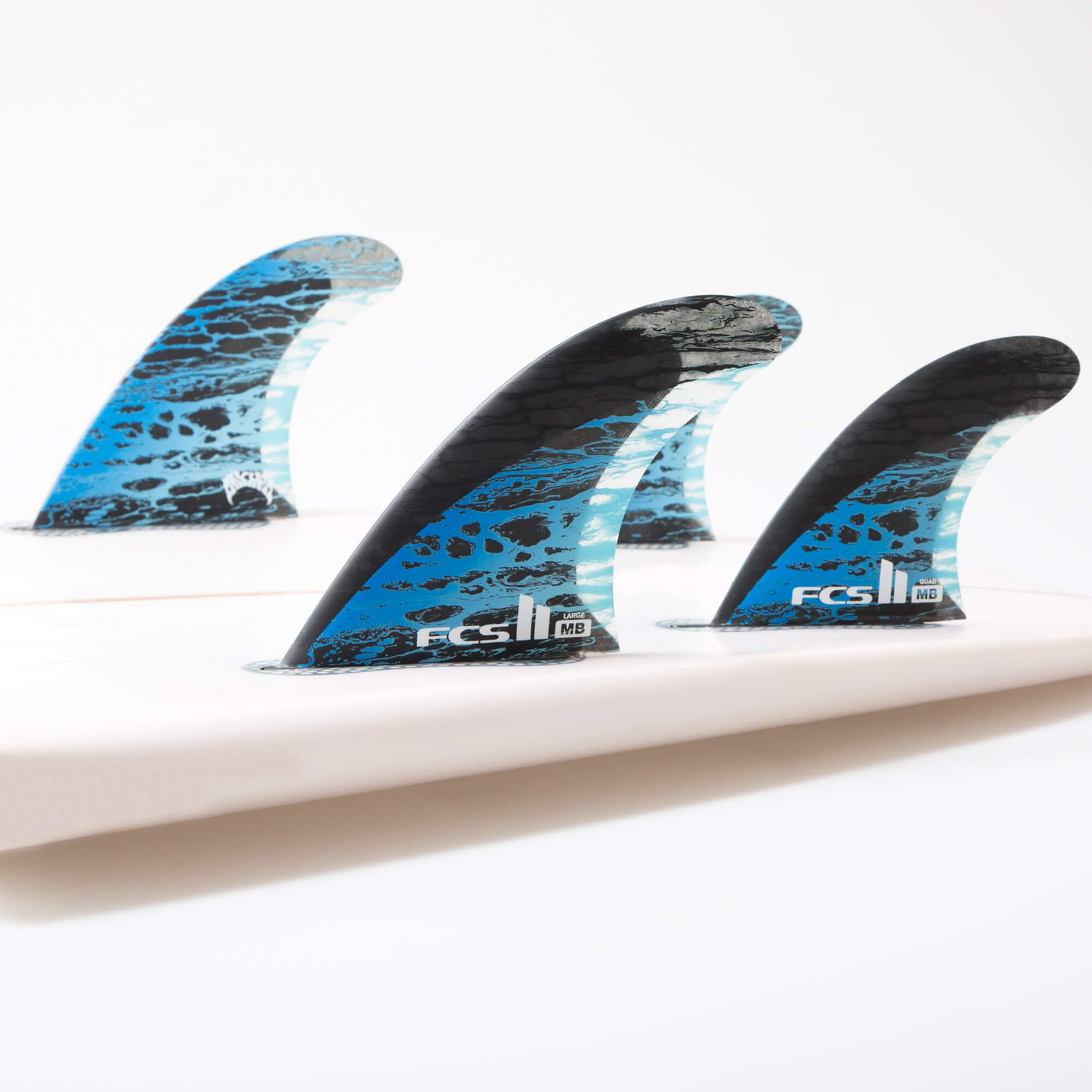 Buy the FCS Matt Biolos PC Carbon Tri-Quad Fins Online Now | Boardcave